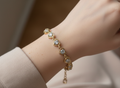 14K CLEAR HEART TENNIS BRACELET