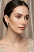 14K CLEAR DROP SHAPE HUGGIE EARRING