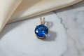14K AQUA BLUE ROUND PENDANT