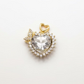 Heart-shaped crystal pendant with gold accents on a white background