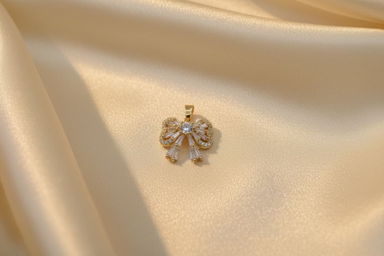 14K CLEAR BOW PENDANT