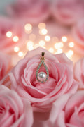 14K CLEAR DROP SHAPED PEARL PENDANT