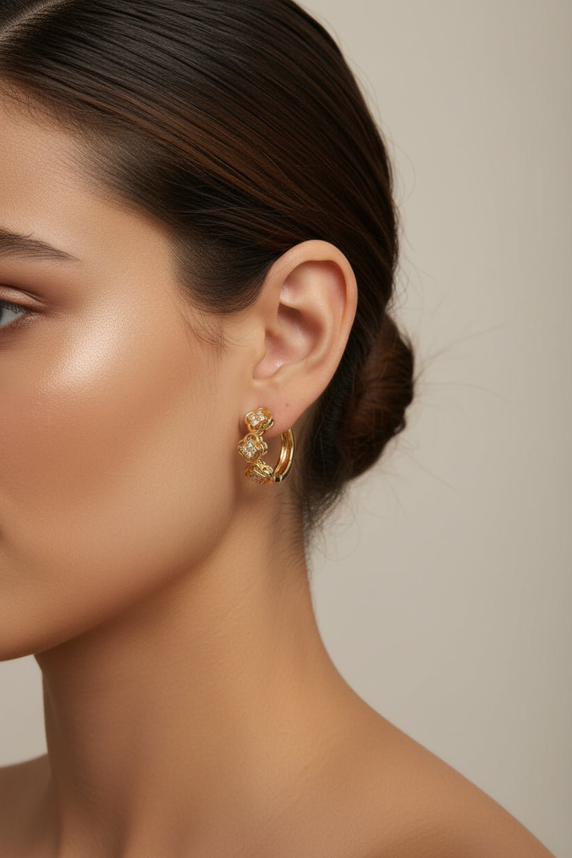 14K CLEAR TRIPLE CLOVER HUGGIE EARRING