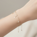 14K CLEAR STAR CHARM BRACELET T-02770001
