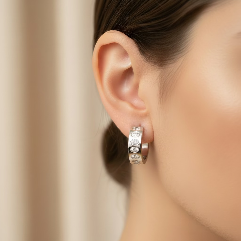 STS CLEAR HUGGIE HOOP EARRING T001129548