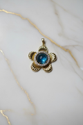 14K BLUE SPINNER FLOWER PENDANT