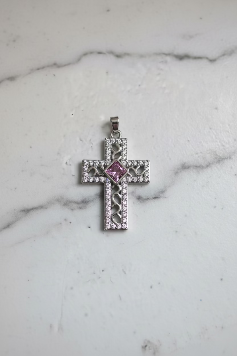 WHG CROSS PENDANT WITH PINK CENTER STONE