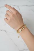 14K VAN CLEEF & ARPELS GOLD FOUR-LEAF CLOVER CHARM BRACELET