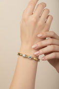 14K BAGUETTE AND ROUND CUT TENNIS BRACELET 320