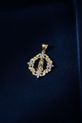 14K FLOWER VIRGIN PEDANT