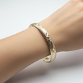 14K 8N DIAMOND-CUT STARBURST BANGLE BRACELET CH-02010750