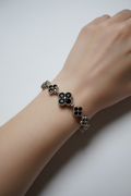 14K GRADUATED BLACK CLOVER TENNIS BRACELET