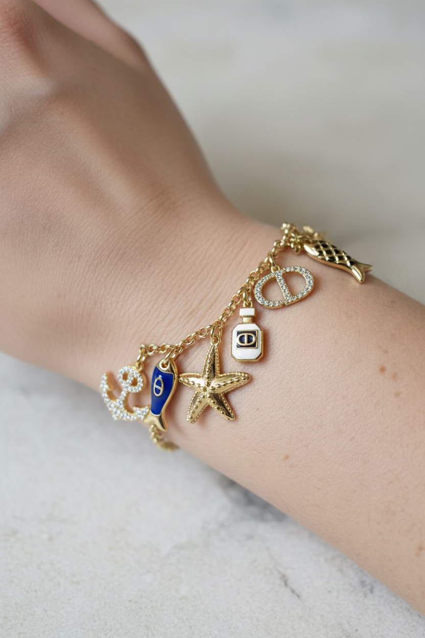 14K INSP CC THE SEA NAUTICAL CHARM BRACELET Um613008B826