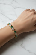14K ALTERNATING EMERALD AND DIAMOND CLOVER TENNIS BRACELET