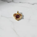 14K A CENTRAL TRIANGULAR RED GEMSTONE CM