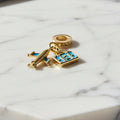 14K TRAVEL THEME PENDANT