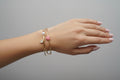 14K PINK CHARMS OPEN CUFF BRACELET S00116647