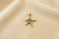 14K SEASTAR BLUE PENDANT