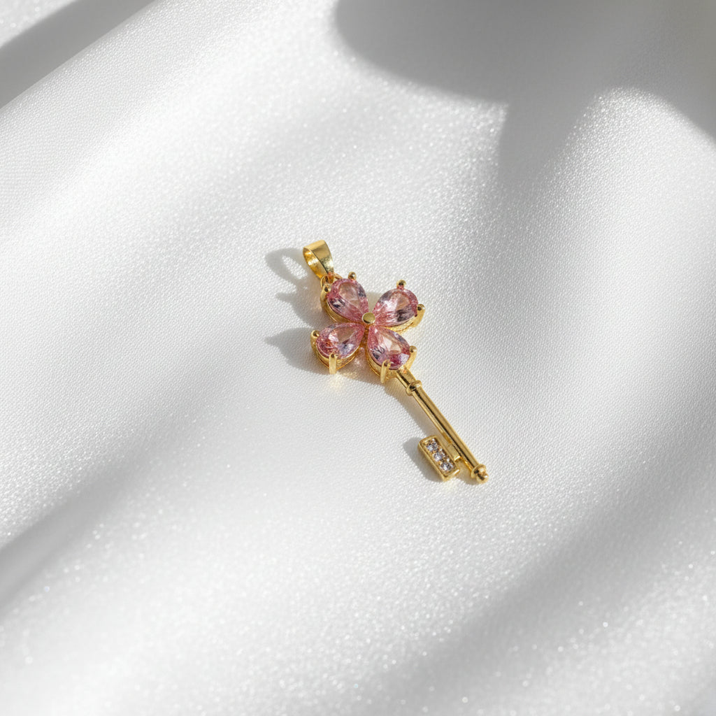 14K KEY WITH A PINK CLOVER AT TOP PENDANT