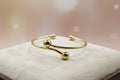 14K TORC-STYLE OPEN BANGLE BRACELET