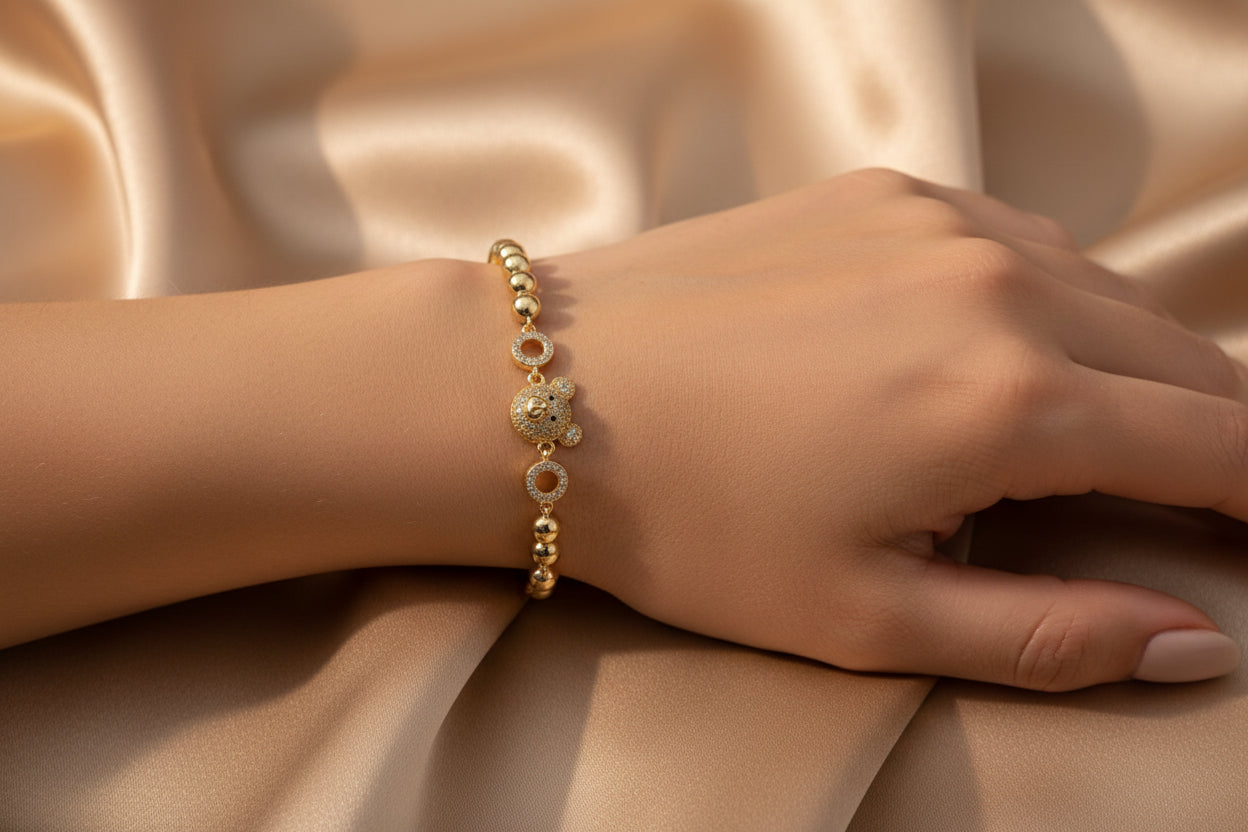 14K TEDDY BEAR CHARM WITH CIRCULAR LINKS BRACELET RQ310