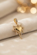 14K NORTH STAR FEATURING A CENTERED HEART PENDANT