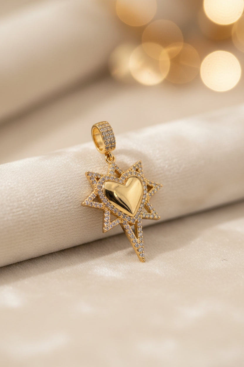 14K NORTH STAR FEATURING A CENTERED HEART PENDANT