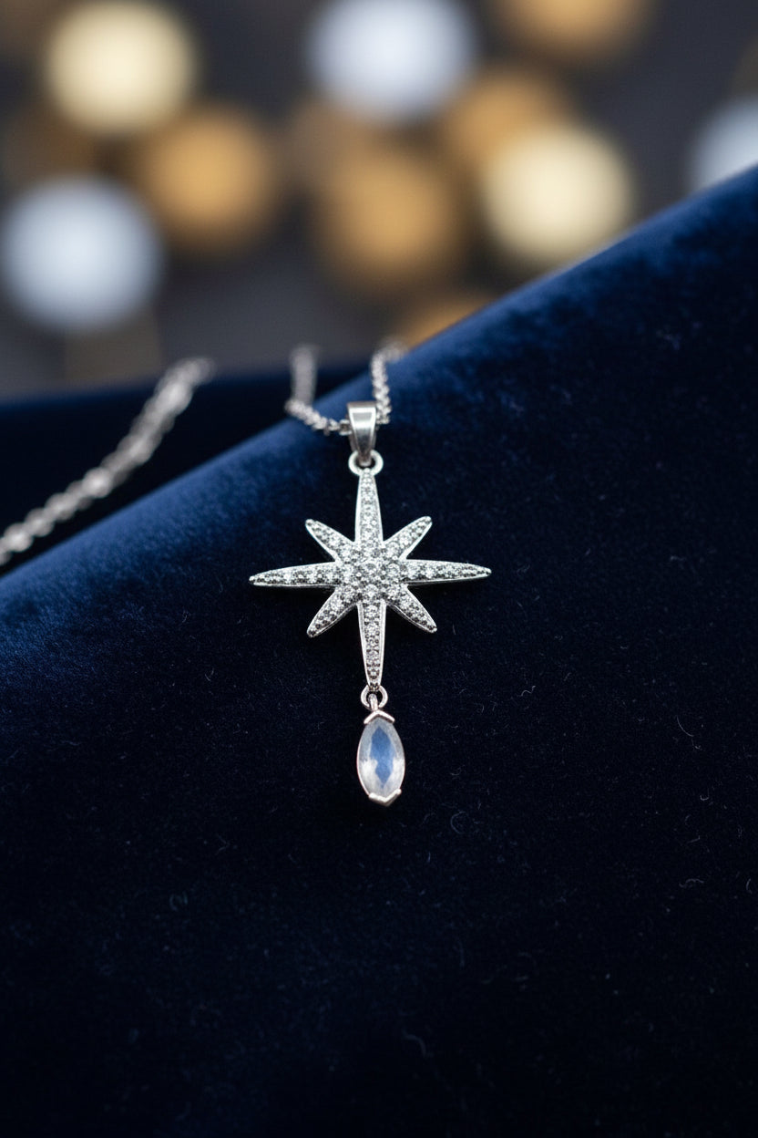 WHG EIGHT-POINTED STAR WITH A TEARDROP PENDANT