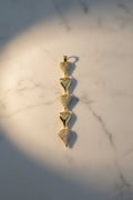 14K LINEAR DROP WITH FIVE LINKED HEART-SHAPED MOTIFS