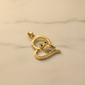 14K OWL CHARM WITH AN OPEN HEART
