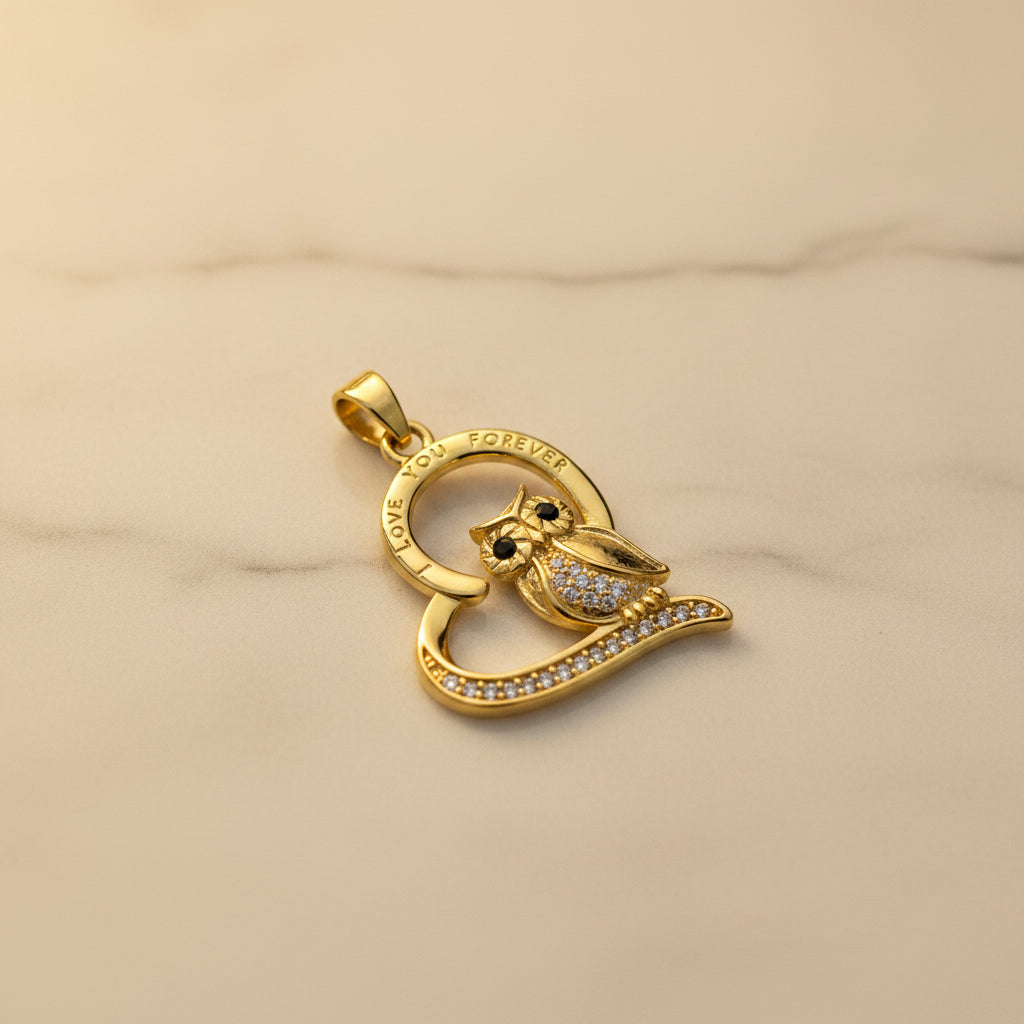 14K OWL CHARM WITH AN OPEN HEART