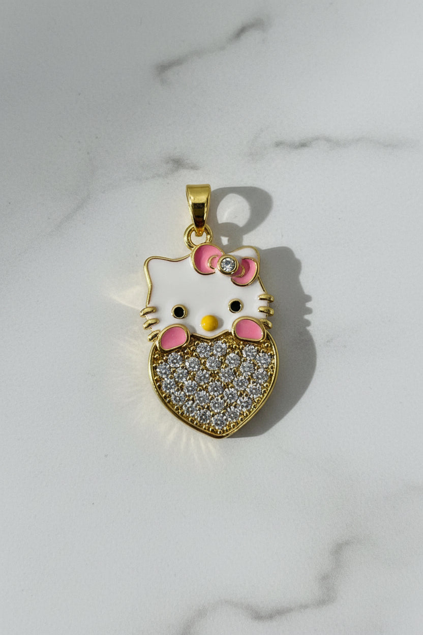 14K HELLO KITTY OVER A HEART PENDANT