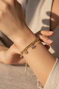 14K CURB LINK BRACELET WITH DANGLE BOWS RQ364