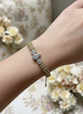 14K OLIVE LEAF HALO TENNIS BRACELET